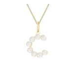 Gold necklace with pendant made of pearls initial letter C