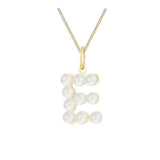 Gold necklace with a pendant made of pearls on a white background initial letter E