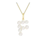 Pearl necklace with gold chain on a white background