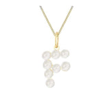 Pearl necklace with gold chain on a white background