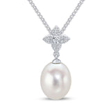 Harrogate Jewellers' Pearl and Diamond Clover Pendant, featuring an 8.5-9mm freshwater pearl and 21 round brilliant-cut lab grown diamonds on a white gold chain, bespoke jewellery for weddings in Yorkshire.