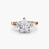 The Odette Solitaire Baguette Sides