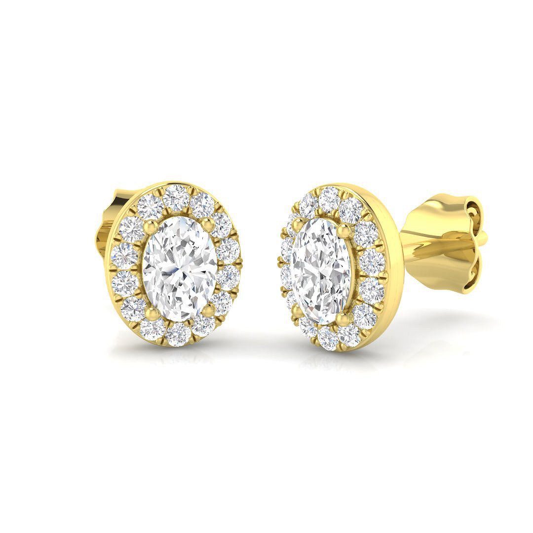 Oval Halo Diamond Earrings by Harrogate Jewellers, set in 18ct gold with earth mined diamonds, perfect for a bespoke Yorkshire wedding.