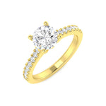 Harrogate Jewellers' Lab Grown Round Brilliant Cut Diamond Ring 1.01ct, an elegant 18ct yellow gold engagement ring with sparkling diamond-set shoulders, perfect for Yorkshire bespoke jewellery seekers.