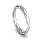 Ladies white gold slight court wedding ring from Harrogate Jewellers. The plain band, crafted for comfort, reflects light subtly against a white background.
