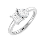 Toi et moi Diamond ring with two smaller diamonds on a white background pear and emerald cut