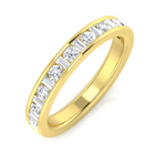 Gold ring with baguette-cut  and round brilliant cut diamonds on a white background