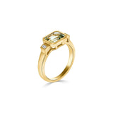Bezel set green amethyst ring with diamond accents by Harrogate Jewellers, perfect for engagement or wedding, crafted in platinum.