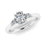 Harrogate Jewellers' 1.22ct Trilogy Ring featuring an oval cut diamond flanked by pear-shaped diamonds, crafted in platinum, perfect for engagement or bespoke Yorkshire jewellery.