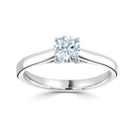 Harrogate Jewellers classic cross-over solitaire engagement ring with a round brilliant cut diamond, set in platinum, on a white background. Earth mined diamond certified by GIA.