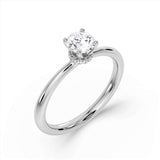 Harrogate Jewellers' Round Brilliant Cut Diamond Engagement Ring, featuring a 0.50ct lab grown diamond in a unique under halo setting, bespoke jewellery from Yorkshire.