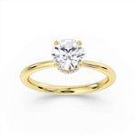 Harrogate Jewellers round brilliant cut diamond engagement ring with under halo design, hand-selected earth mined diamond, crafted in white gold against a white backdrop, bespoke jewellery from Yorkshire.