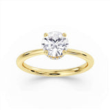 Harrogate Jewellers round brilliant cut diamond engagement ring with under halo design, hand-selected earth mined diamond, crafted in white gold against a white backdrop, bespoke jewellery from Yorkshire.