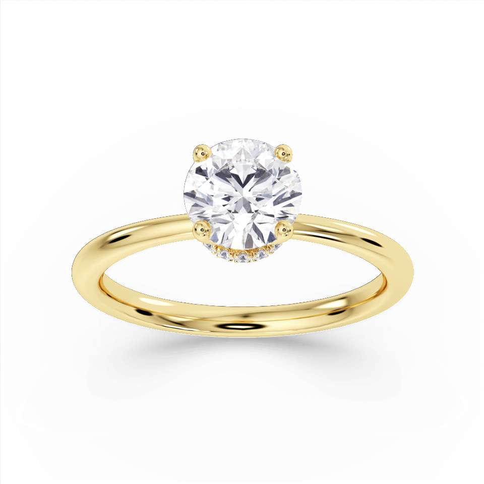 Harrogate Jewellers round brilliant cut diamond engagement ring with under halo design, hand-selected earth mined diamond, crafted in white gold against a white backdrop, bespoke jewellery from Yorkshire.