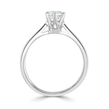 Harrogate Jewellers' six-claw classic solitaire engagement ring featuring a brilliant round cut earth-mined diamond, set in white gold, with a detailed view of its intricate design on a clean white background.