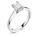 Classic Emerald Cut Solitaire Diamond Engagement Ring by Harrogate Jewellers, showcasing a brilliant earth-mined diamond on a platinum band, bespoke jewellery from Yorkshire.