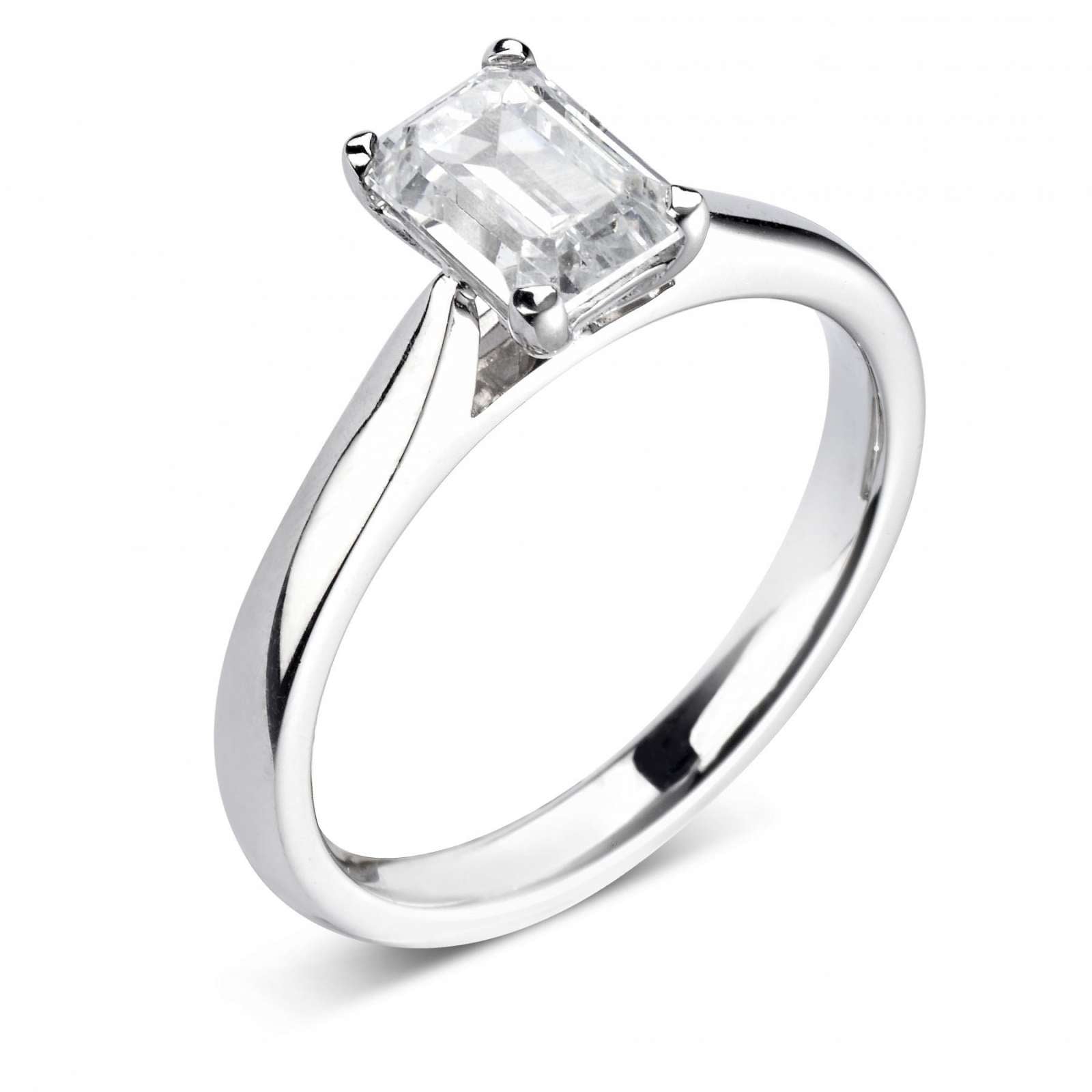 Classic Emerald Cut Solitaire Diamond Engagement Ring by Harrogate Jewellers, showcasing a brilliant earth-mined diamond on a platinum band, bespoke jewellery from Yorkshire.