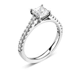 Harrogate Jewellers' Tapered Claw Set Princess Cut Diamond Engagement Ring in platinum, with a large, square-cut diamond and smaller diamonds on white gold band.