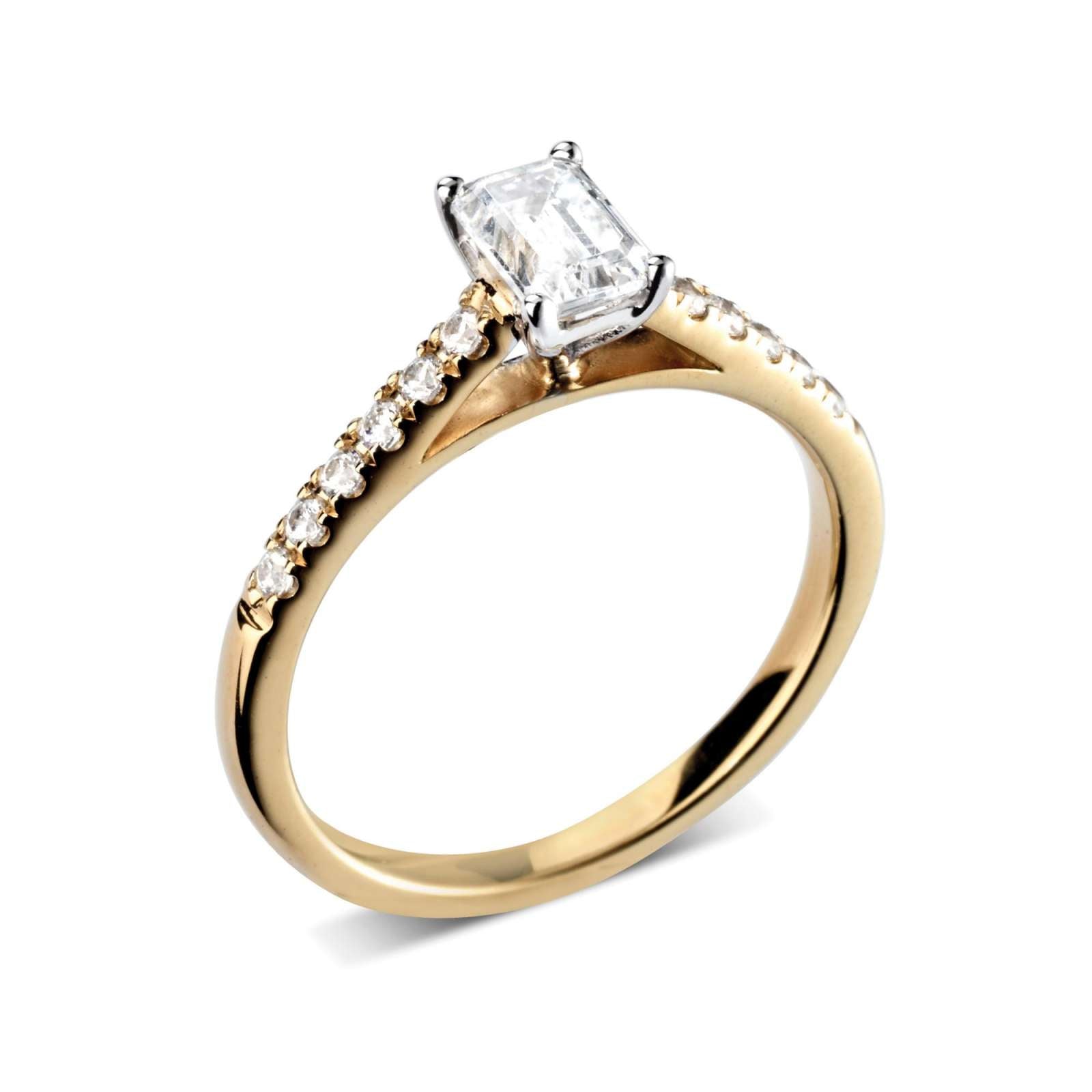 Harrogate Jewellers' Tapered Claw Set Emerald Cut Diamond Engagement Ring, featuring a brilliant central diamond and tapered diamond-set shoulders in white gold.