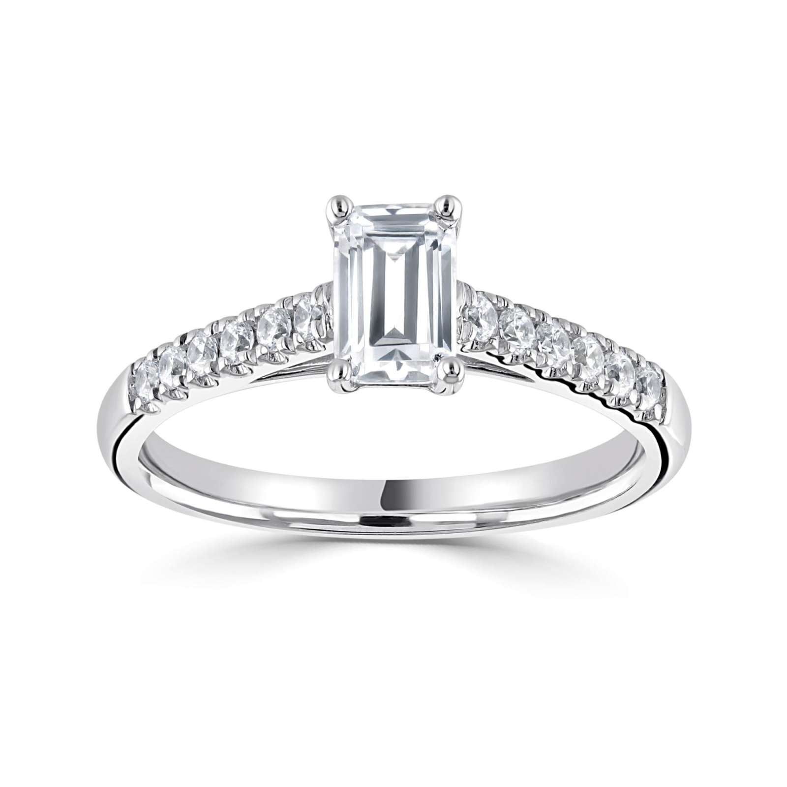 Harrogate Jewellers' Tapered Claw Set Emerald Cut Diamond Engagement Ring, featuring a central earth-mined diamond, accentuated with a row of smaller diamonds in a platinum band.