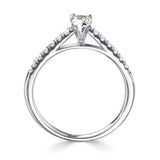 Harrogate Jewellers pear cut diamond engagement ring, with a tapered claw setting and diamond-set shoulders, made of platinum, a popular bespoke jewellery choice in Yorkshire.