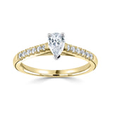 Tapered Claw Set Pear Cut Diamond Engagement Ring by Harrogate Jewellers, showcasing a central hand-selected diamond with smaller stones on platinum band, ideal for bespoke Yorkshire wedding jewellery.