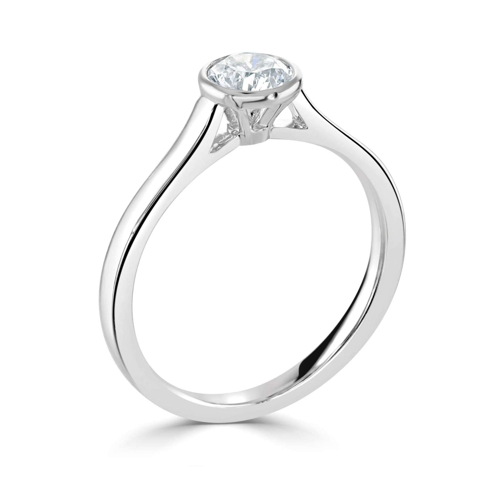 Bezel Set Round Brilliant Cut Solitaire Diamond Engagement Ring by Harrogate Jewellers, featuring a single Earth Mined Diamond, crafted in platinum or white gold. Ideal for bespoke Yorkshire wedding jewellery.
