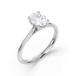 Classic Oval Cut Solitaire Diamond Engagement Ring from Harrogate Jewellers, expertly crafted in platinum with Earth Mined Diamonds, set in a four-claw setting, radiating timeless elegance and bespoke Yorkshire jewellery design.