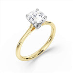 Harrogate Jewellers' Signature Hidden Diamond Solitaire Engagement Ring in platinum, featuring a large round cut Earth Mined Diamond, smaller accent diamonds and bespoke Yorkshire design.