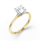 Harrogate Jewellers' Signature Hidden Diamond Solitaire Engagement Ring in platinum, featuring a large round cut Earth Mined Diamond, smaller accent diamonds and bespoke Yorkshire design.