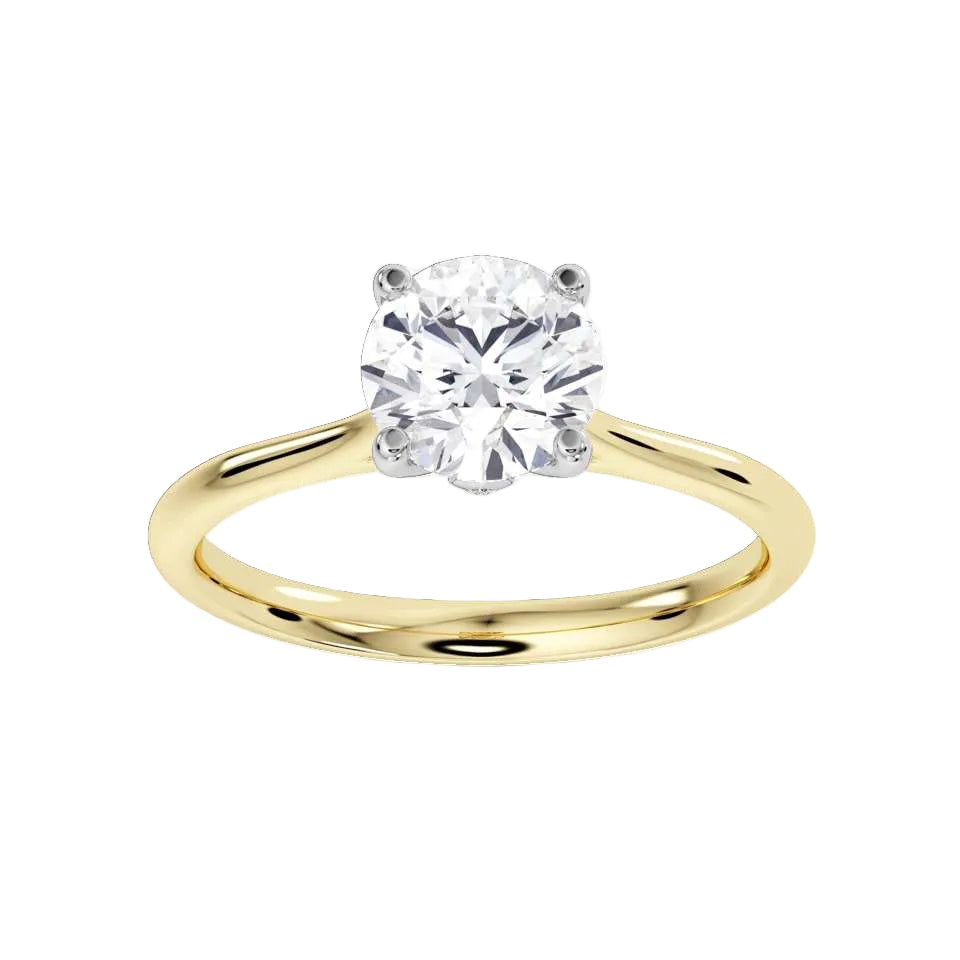 Signature Hidden Diamond Solitaire Engagement Ring by Harrogate Jewellers, featuring a round brilliant cut diamond in a four claw setting and a secret diamond detail. Earth Mined Diamond Wedding Ring in Yorkshire.