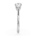 Signature Hidden Diamond Solitaire Engagement Ring by Harrogate Jewellers, featuring a round brilliant cut Earth Mined Diamond, in platinum setting, Yorkshire bespoke jewellery.