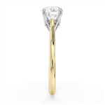 Harrogate Jewellers Signature Hidden Diamond Solitaire Engagement Ring, featuring a large round, earth mined diamond in a platinum band, surrounded by smaller diamonds, bespoke jewellery from Yorkshire.