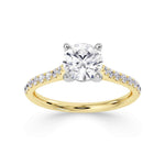 Tapered claw set round brilliant cut diamond engagement ring from Harrogate Jewellers, featuring elegant diamond-set shoulders and a hand-selected 1.00ct diamond, perfect for bespoke Yorkshire weddings.