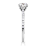 Tapered Claw Set Round Brilliant Cut Diamond Engagement Ring 1.00ct by Harrogate Jewellers, a platinum band adorned with diamonds against a white background, bespoke jewellery in Yorkshire