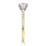 Harrogate Jewellers' Tapered Claw Set Round Brilliant Cut Diamond Engagement Ring, featuring a 1.00ct Earth Mined Diamond, accentuated with a platinum band with smaller diamonds, bespoke jewellery from Yorkshire.