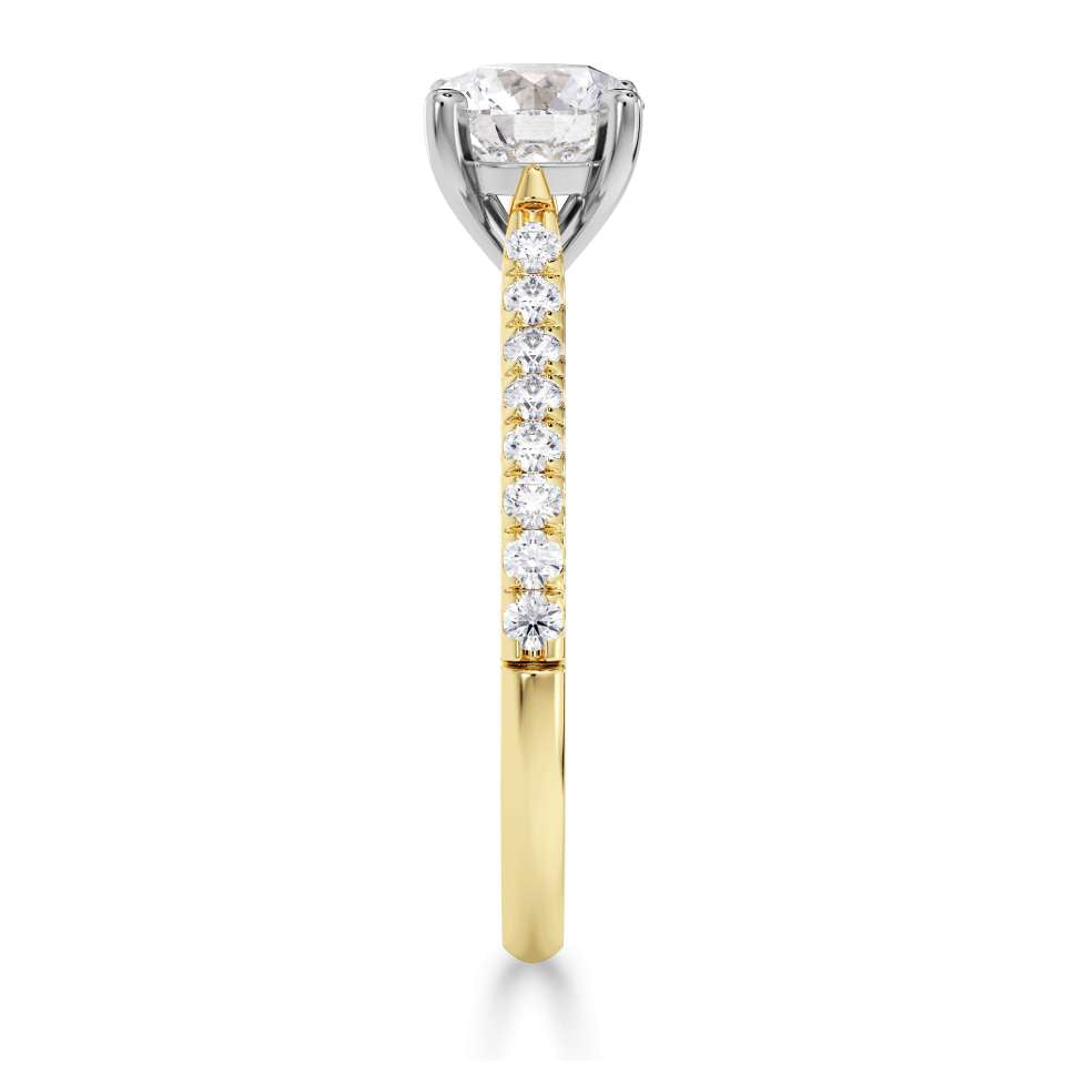 Harrogate Jewellers' Tapered Claw Set Round Brilliant Cut Diamond Engagement Ring, featuring a 1.00ct Earth Mined Diamond, accentuated with a platinum band with smaller diamonds, bespoke jewellery from Yorkshire.