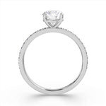 Harrogate Jewellers' Round Brilliant Cut Diamond Engagement Ring with Grain Set Shoulders, showcasing an Earth Mined Diamond, complemented by a white gold band, bespoke jewellery in Harrogate Yorkshire.