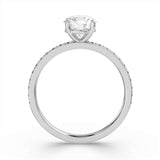 Harrogate Jewellers' Round Brilliant Cut Diamond Engagement Ring with Grain Set Shoulders, showcasing an Earth Mined Diamond, complemented by a white gold band, bespoke jewellery in Harrogate Yorkshire.