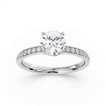 Round Brilliant Cut Diamond Engagement Ring with Grain Set Shoulders by Harrogate Jewellers, featuring a central earth-mined diamond, side-stones and platinum band.