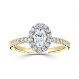Oval Cut Diamond Halo Shoulder Set Engagement Ring by Harrogate Jewellers, featuring a central Earth Mined Diamond surrounded by smaller stones against a platinum band, representative of bespoke jewellery in Yorkshire.