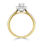 Emerald Cut Diamond Halo Shoulder Set Engagement Ring by Harrogate Jewellers, featuring a prominent diamond encircled by smaller stones on a white gold band.