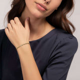 Art Deco Diamond Mixed Cut Bangle on a woman's wrist, a bespoke jewellery piece by Harrogate Jewellers in Yorkshire, featuring lab grown diamonds.